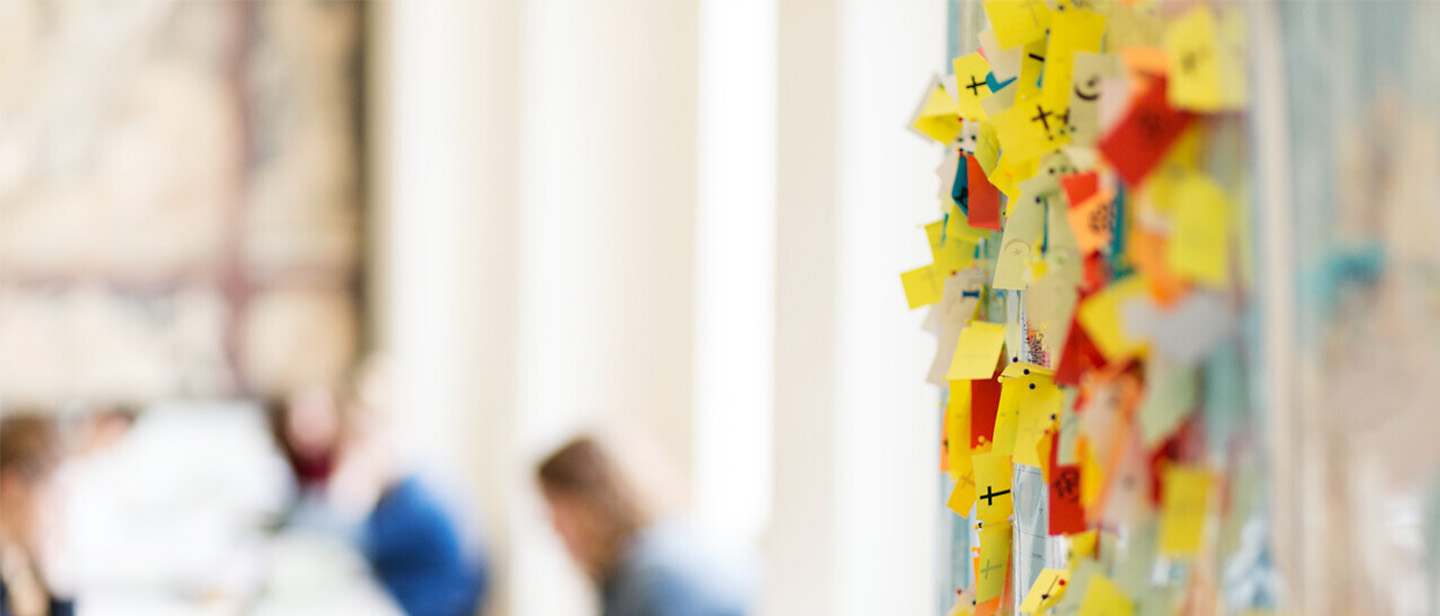 Picture of information board with sticky notes